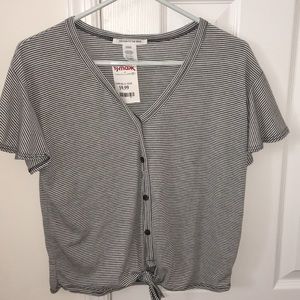 Caution to the wind black and white striped top.